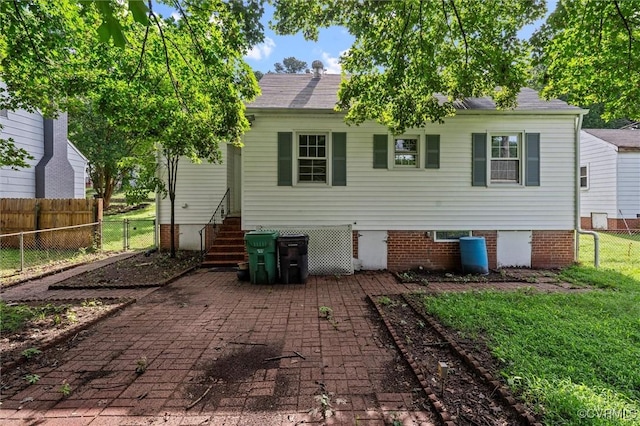 914 Kensington Ave, Colonial Heights, VA 23834 - rear view of property featuring a fenced backyard, roof with shingles, and a patio area