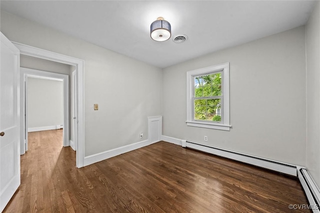914 Kensington Ave, Colonial Heights, VA 23834 - empty room with baseboard heating and wood finished floors