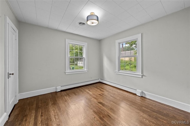 914 Kensington Ave, Colonial Heights, VA 23834 - unfurnished bedroom featuring wood finished floors and baseboard heating