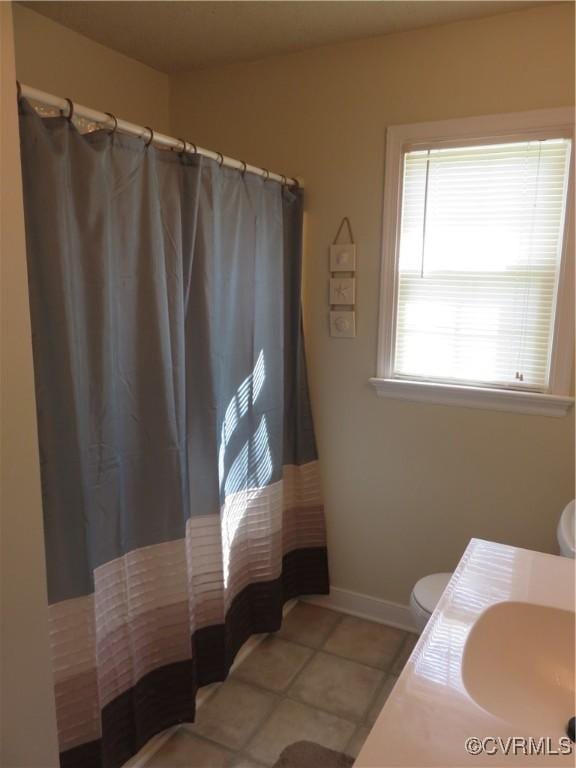 6329 Sledds Lake Rd, Mechanicsville, VA 23111 - full bath with tile patterned flooring, curtained shower, and vanity