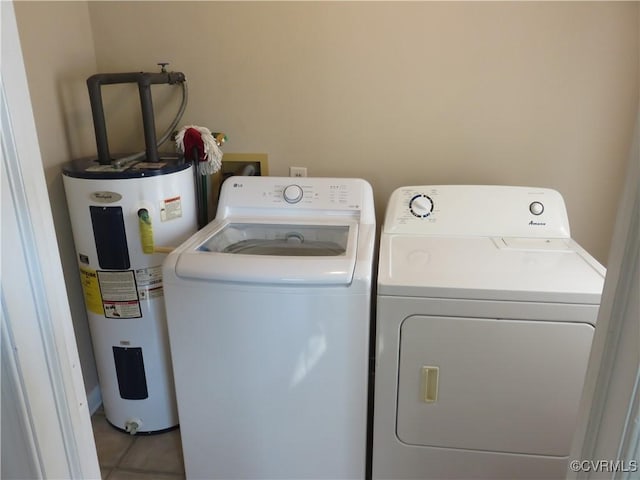6329 Sledds Lake Rd, Mechanicsville, VA 23111 - laundry area featuring water heater, independent washer and dryer, and tile patterned floors