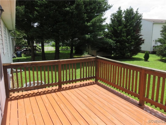 6329 Sledds Lake Rd, Mechanicsville, VA 23111 - wooden deck featuring a lawn