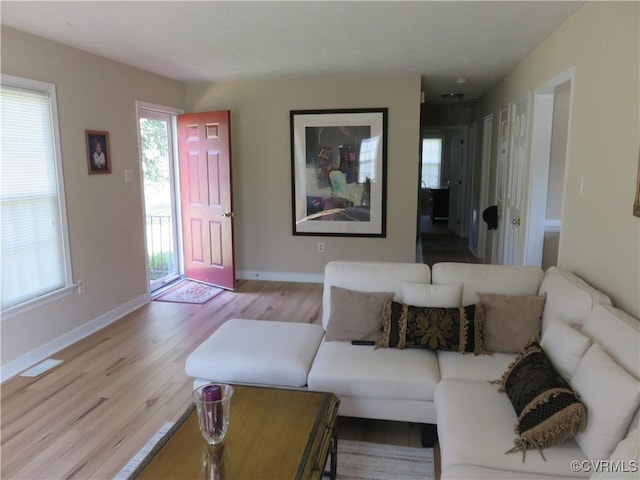 6329 Sledds Lake Rd, Mechanicsville, VA 23111 - living room with light wood-type flooring and healthy amount of natural light
