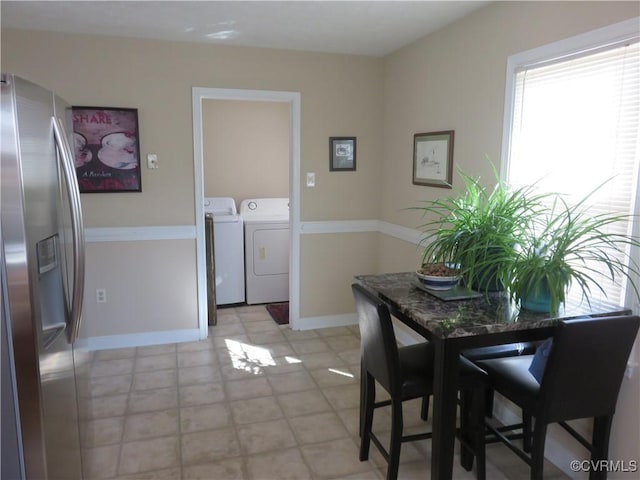 6329 Sledds Lake Rd, Mechanicsville, VA 23111 - dining area featuring washing machine and clothes dryer and baseboards