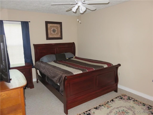 6329 Sledds Lake Rd, Mechanicsville, VA 23111 - bedroom with light carpet, a ceiling fan, and a textured ceiling