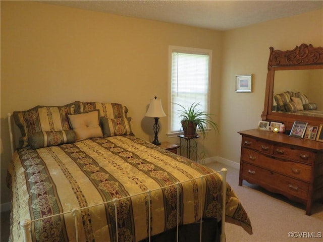 6329 Sledds Lake Rd, Mechanicsville, VA 23111 - carpeted bedroom with baseboards