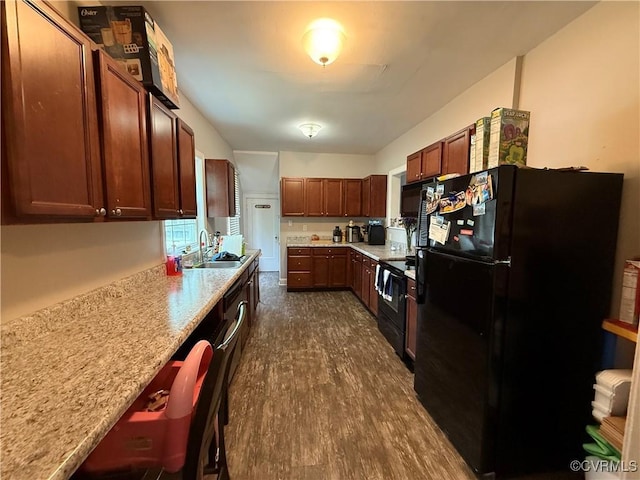 1806 Powhatan Ave, Petersburg, VA 23805 - kitchen featuring black appliances, light countertops, and dark wood-style flooring