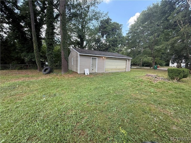 1806 Powhatan Ave, Petersburg, VA 23805 - view of yard featuring an outdoor structure and a garage