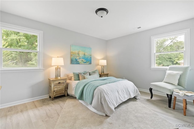 606 Bermuda Hundred Rd, Chester, VA 23836 - bedroom with baseboards and light wood finished floors