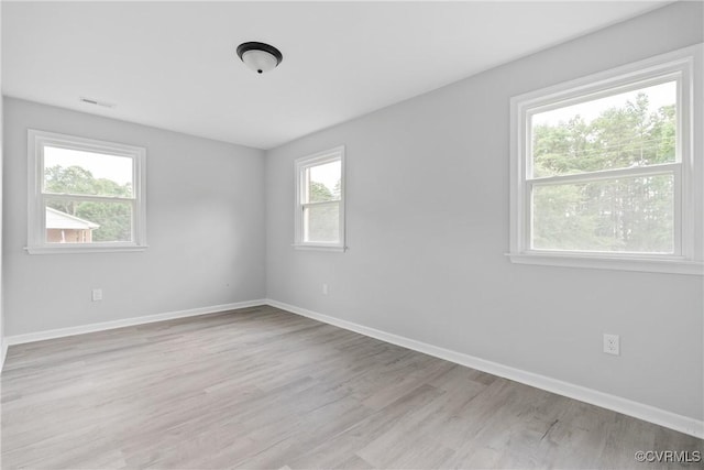 606 Bermuda Hundred Rd, Chester, VA 23836 - spare room featuring baseboards and light wood-style floors