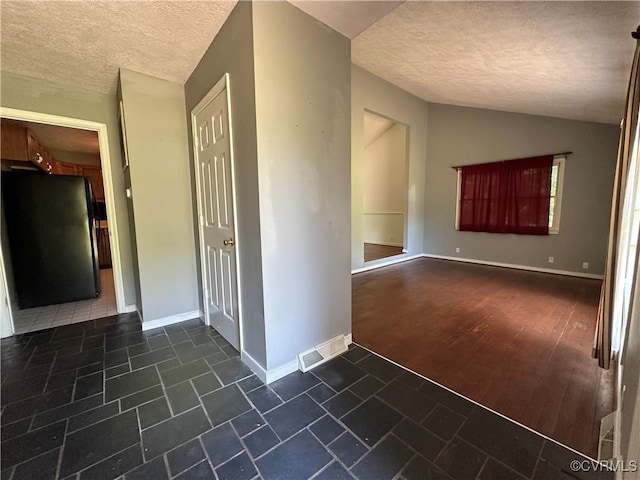 8253 Skirmish Ln, Mechanicsville, VA 23111 - empty room with a textured ceiling and lofted ceiling