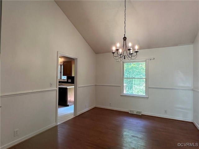 8253 Skirmish Ln, Mechanicsville, VA 23111 - unfurnished room featuring a chandelier, wood finished floors, and lofted ceiling