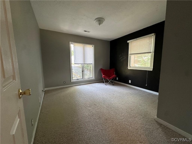 8253 Skirmish Ln, Mechanicsville, VA 23111 - empty room featuring carpet and plenty of natural light