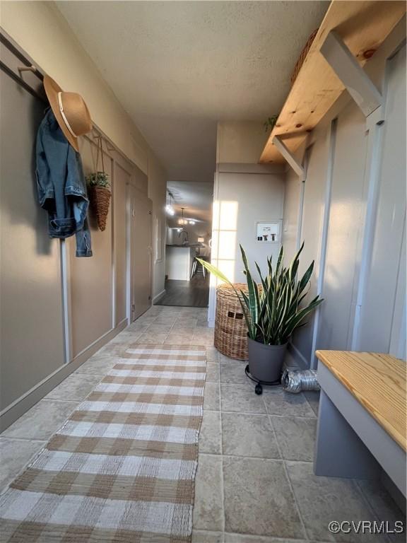 5225 Hopewell Rd, New Kent, VA 23124 - corridor featuring light tile patterned flooring