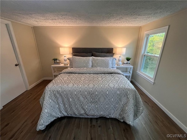 5225 Hopewell Rd, New Kent, VA 23124 - bedroom featuring a textured ceiling, dark wood-style floors, and ornamental molding