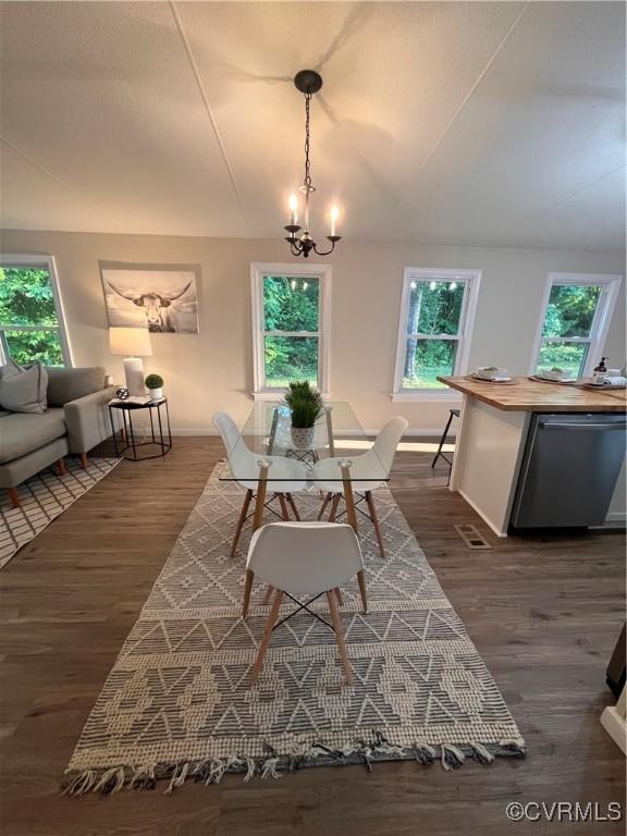 5225 Hopewell Rd, New Kent, VA 23124 - dining room featuring a chandelier and dark wood-type flooring