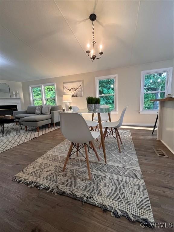 5225 Hopewell Rd, New Kent, VA 23124 - dining area featuring a fireplace and wood finished floors