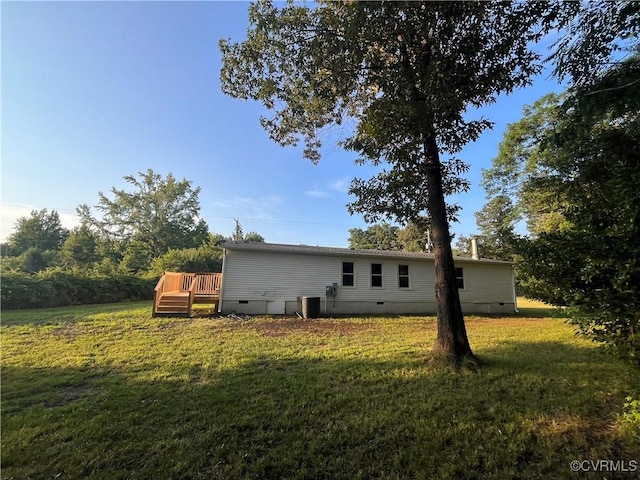 5225 Hopewell Rd, New Kent, VA 23124 - back of property featuring crawl space, a yard, and a wooden deck