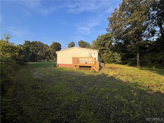 5225 Hopewell Rd, New Kent, VA 23124 - view of grassy yard with a deck