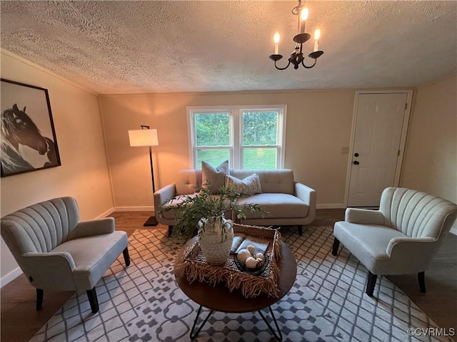 5225 Hopewell Rd, New Kent, VA 23124 - living area featuring a textured ceiling, a chandelier, and wood finished floors