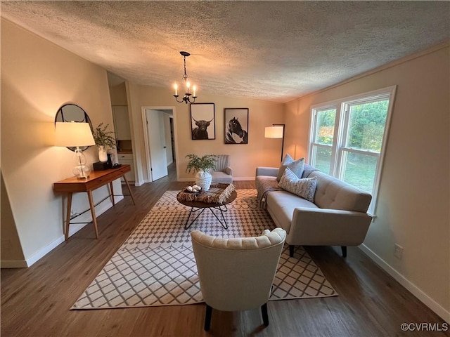 5225 Hopewell Rd, New Kent, VA 23124 - living area with a textured ceiling, a chandelier, and wood finished floors
