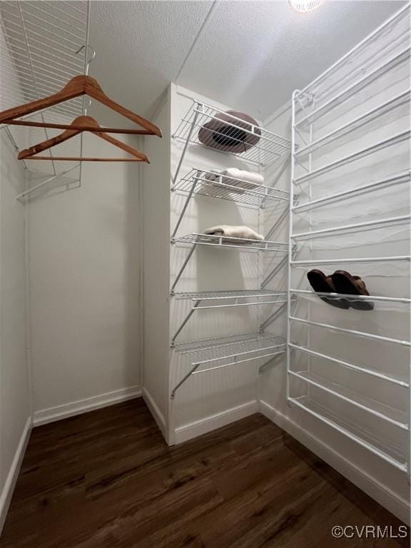 5225 Hopewell Rd, New Kent, VA 23124 - spacious closet featuring dark wood-type flooring