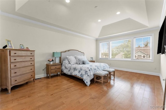 6636 Stonewolf Ct, Moseley, VA 23120 - bedroom featuring a raised ceiling, light wood-type flooring, recessed lighting, ornamental molding, and lofted ceiling