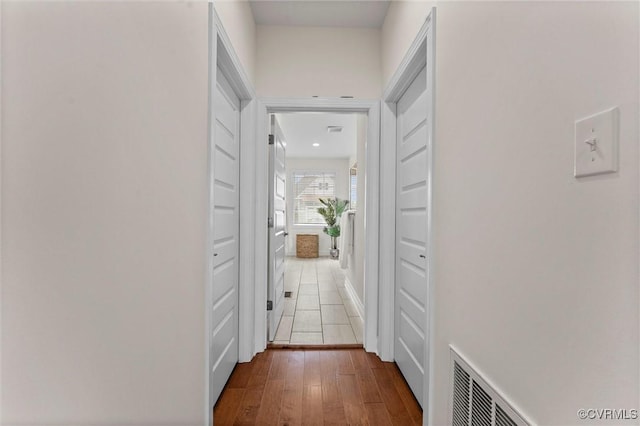 6636 Stonewolf Ct, Moseley, VA 23120 - corridor featuring wood-type flooring and baseboards