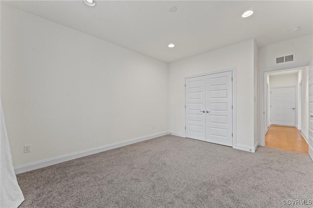 6636 Stonewolf Ct, Moseley, VA 23120 - unfurnished bedroom with carpet, recessed lighting, and a closet