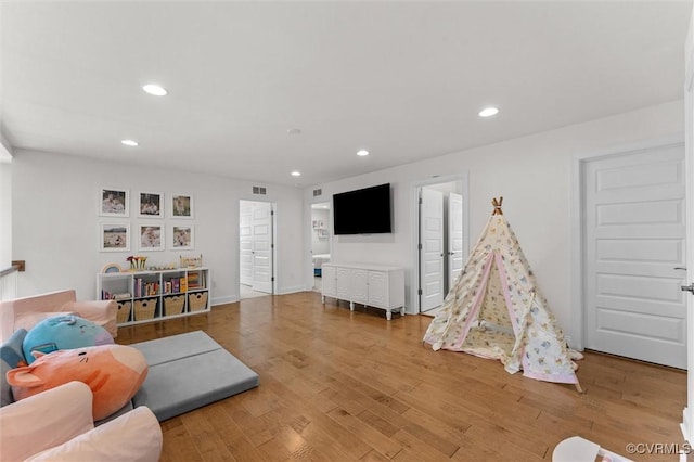 6636 Stonewolf Ct, Moseley, VA 23120 - living room featuring recessed lighting and wood finished floors