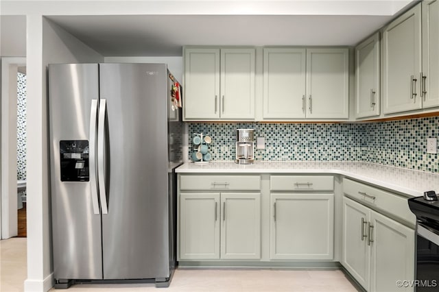 13926 Sagebrook Rd, Midlothian, VA 23112 - kitchen featuring stainless steel fridge with ice dispenser, light countertops, and decorative backsplash