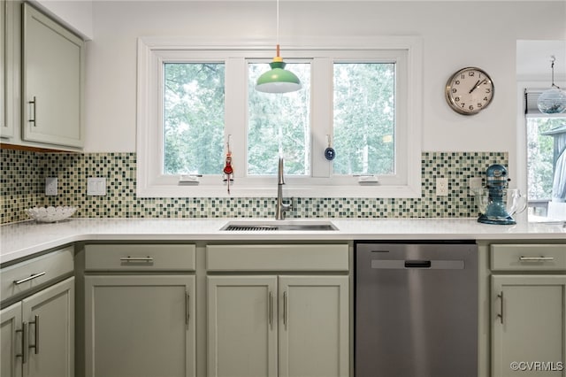 13926 Sagebrook Rd, Midlothian, VA 23112 - kitchen with stainless steel dishwasher, light countertops, backsplash, gray cabinets, and pendant lighting