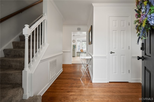 13926 Sagebrook Rd, Midlothian, VA 23112 - hall with wood finished floors, stairs, and ornamental molding