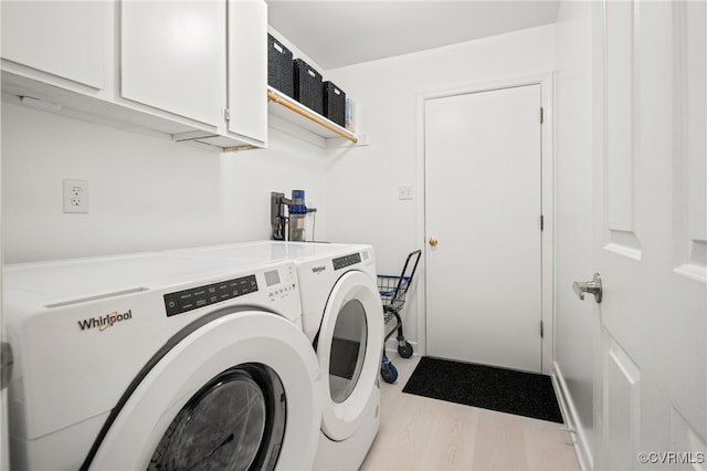 13926 Sagebrook Rd, Midlothian, VA 23112 - laundry area with cabinet space, washing machine and dryer, and wood finished floors