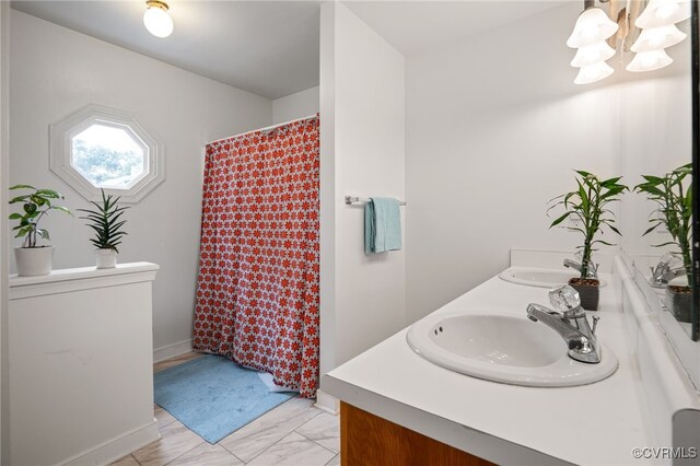 13926 Sagebrook Rd, Midlothian, VA 23112 - full bath with a chandelier, double vanity, marble finish floors, and a shower with curtain