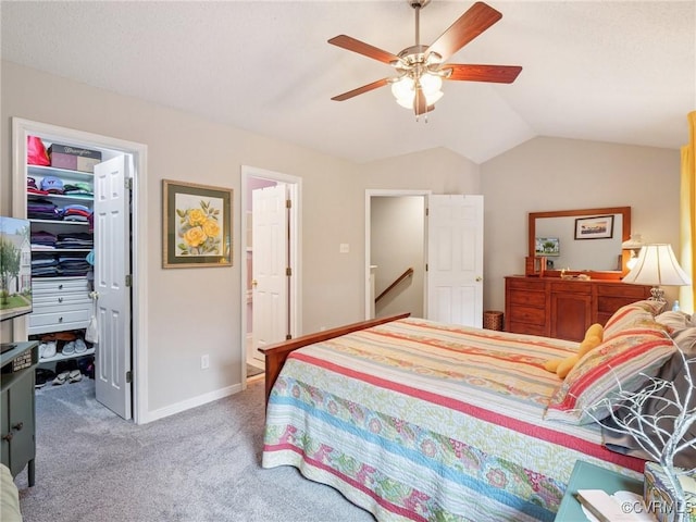 3034 Sara Jean Ter, Glen Allen, VA 23060 - carpeted bedroom featuring a walk in closet, vaulted ceiling, a closet, ceiling fan, and connected bathroom