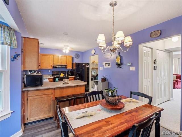 3034 Sara Jean Ter, Glen Allen, VA 23060 - dining area featuring a chandelier and dark wood-style floors