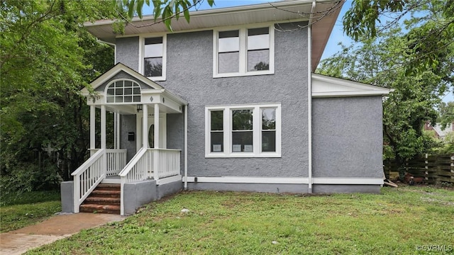 1531 Berkeley Ave, Petersburg, VA 23805 - view of front facade featuring a front lawn and stucco siding