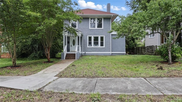 1531 Berkeley Ave, Petersburg, VA 23805 - american foursquare style home featuring a chimney and stucco siding