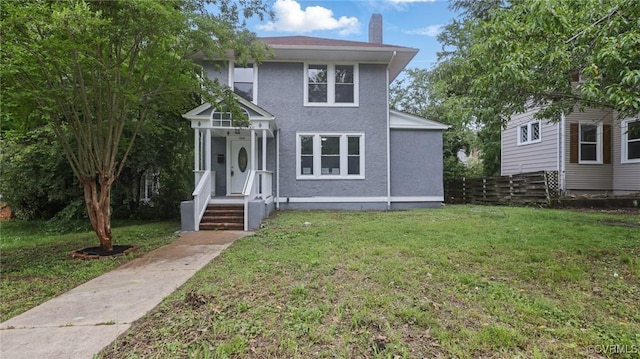 1531 Berkeley Ave, Petersburg, VA 23805 - traditional style home featuring a chimney and stucco siding