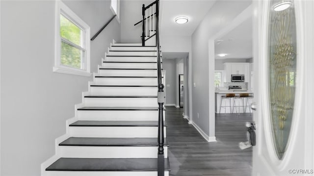 1531 Berkeley Ave, Petersburg, VA 23805 - stairway featuring wood finished floors and baseboards