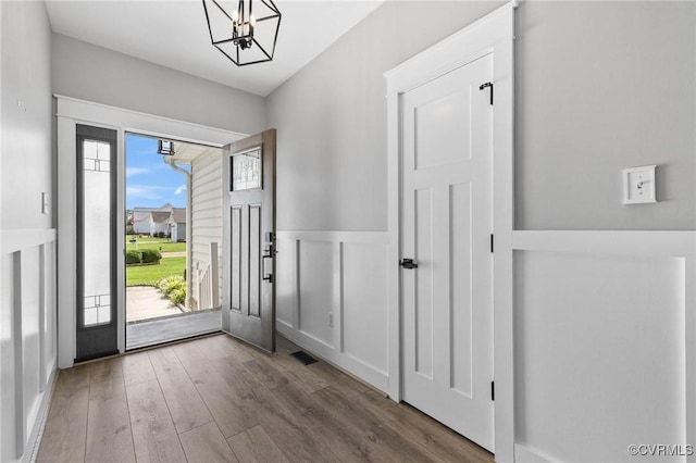 3130 Tinsley Ter, Prince George, VA 23875 - entrance foyer featuring a chandelier and wood finished floors