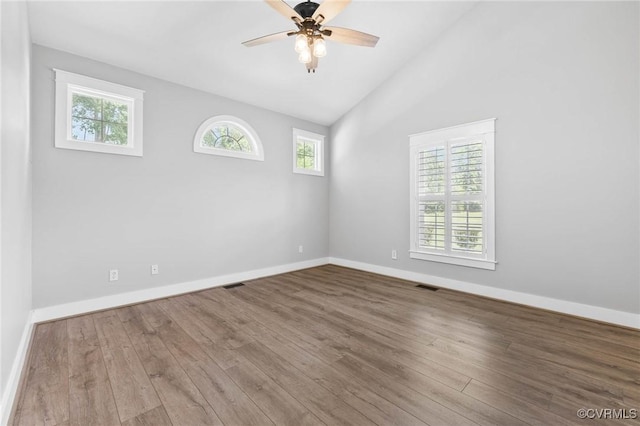 3130 Tinsley Ter, Prince George, VA 23875 - empty room with wood finished floors, a ceiling fan, and vaulted ceiling