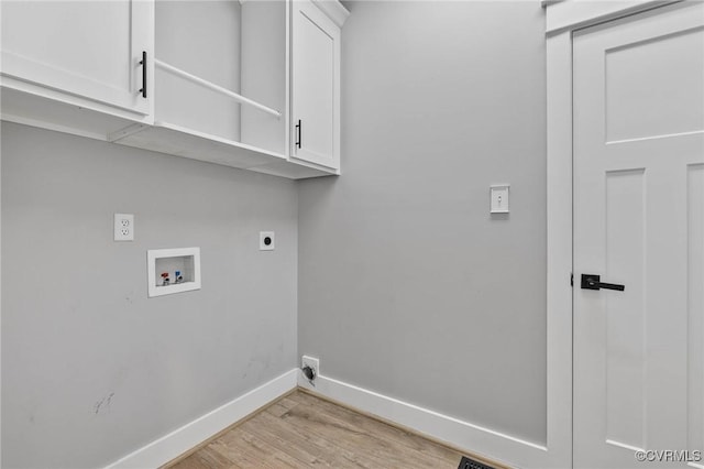 3130 Tinsley Ter, Prince George, VA 23875 - laundry room with cabinet space, electric dryer hookup, light wood-style flooring, and hookup for a washing machine