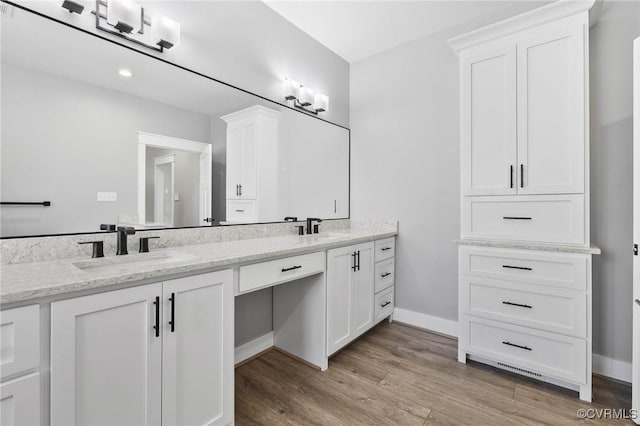 3130 Tinsley Ter, Prince George, VA 23875 - full bath with double vanity and wood finished floors