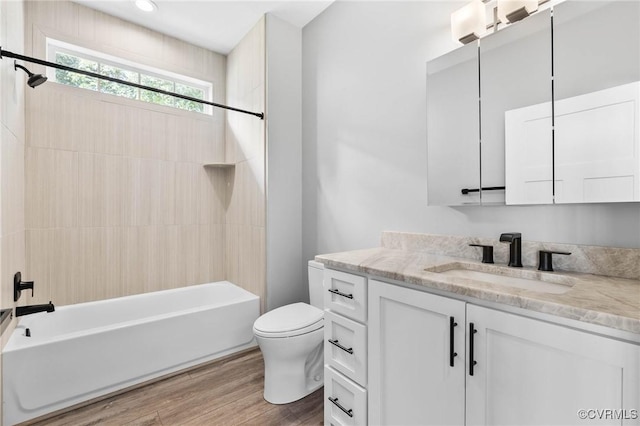 3130 Tinsley Ter, Prince George, VA 23875 - full bath featuring vanity, shower / washtub combination, and wood finished floors