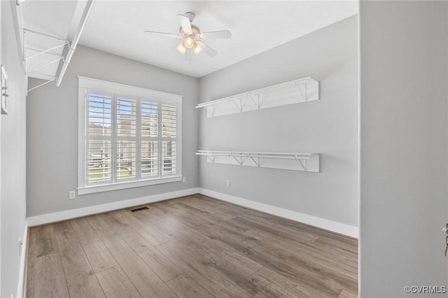 3130 Tinsley Ter, Prince George, VA 23875 - unfurnished room featuring a ceiling fan and wood finished floors