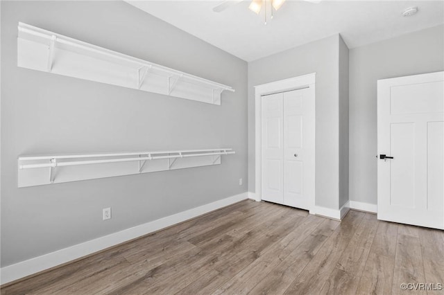 3130 Tinsley Ter, Prince George, VA 23875 - unfurnished bedroom with a closet, wood finished floors, and a ceiling fan