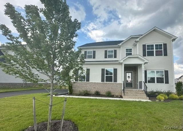 7079 Hepworth Dr, Henrico, VA 23231 - view of front facade with a front lawn and brick siding