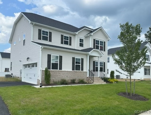 7079 Hepworth Dr, Henrico, VA 23231 - view of front of property featuring an attached garage, brick siding, a front lawn, and asphalt driveway